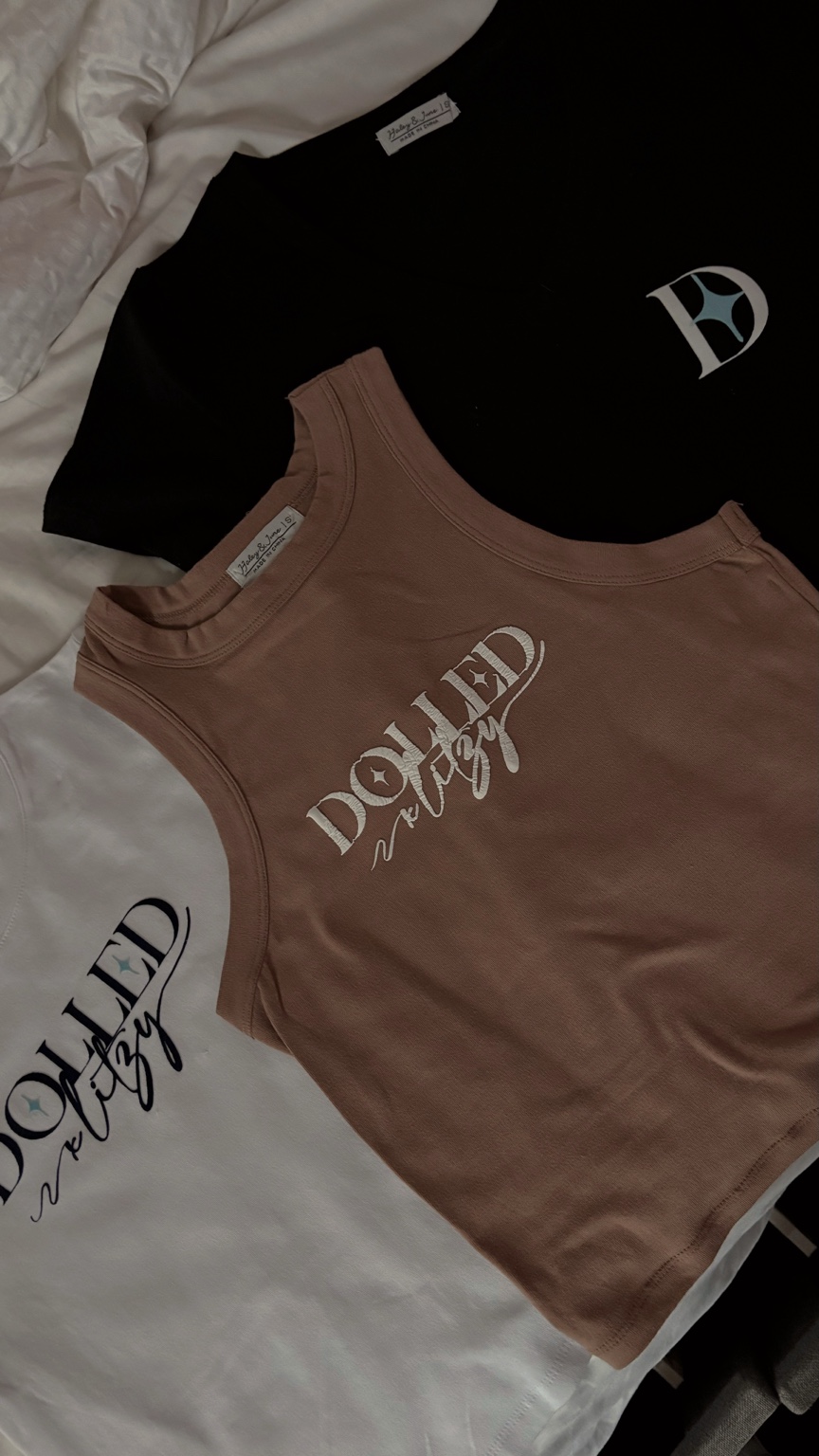 Dolled and Fly custom apparel in black, white and blush